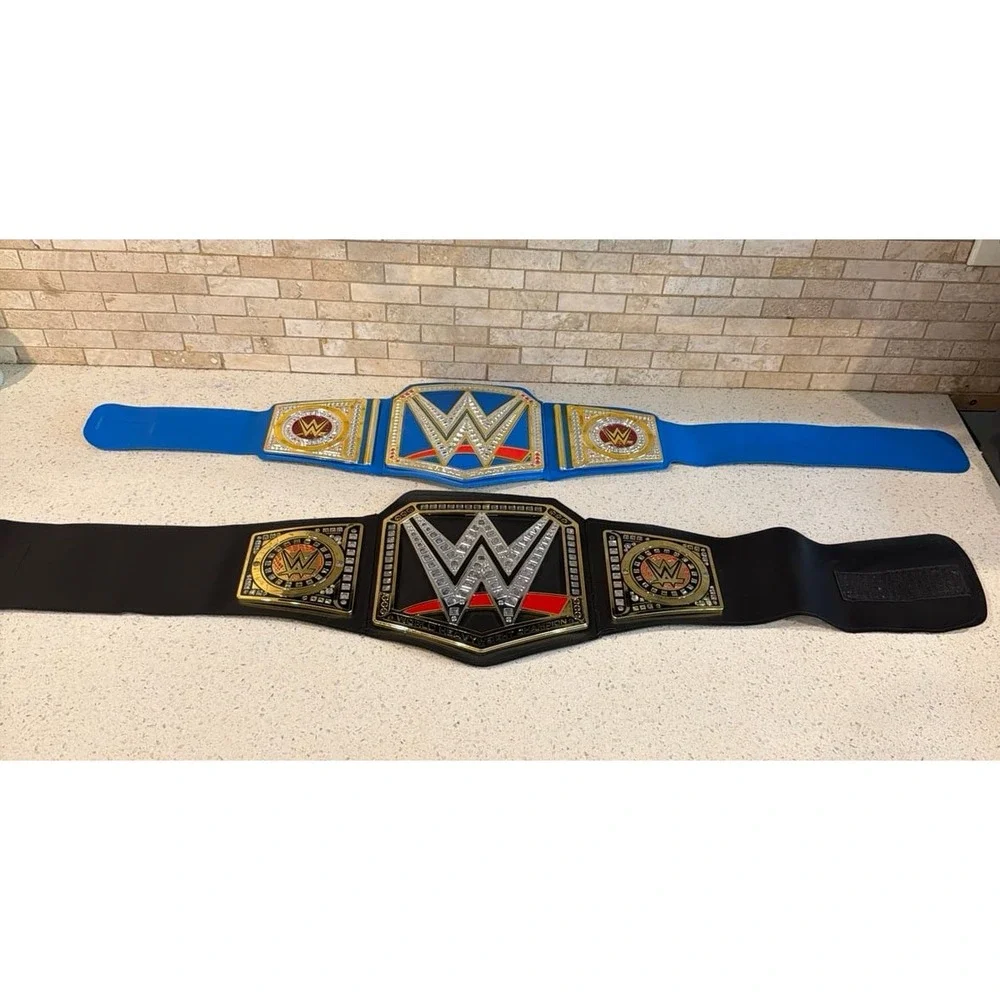 Pre-owned WWE kids role-play championship belts. Normal play wear.